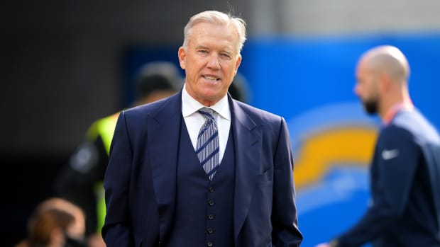 Denver Broncos president of football operations John Elway looks on before the game against the Los Angeles Chargers at SoFi Stadium.